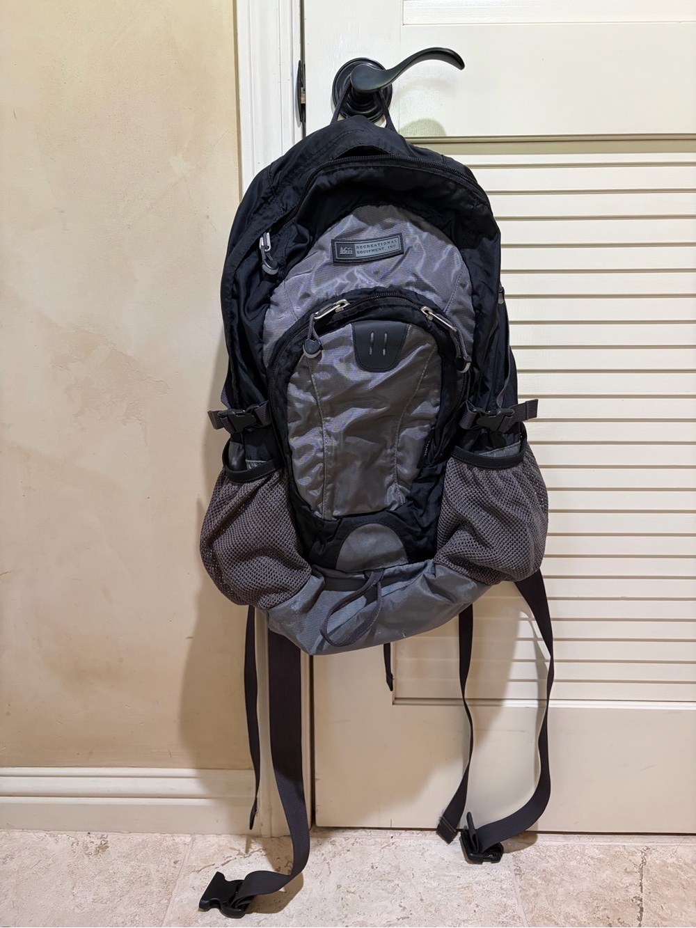Black and gray REI trail backpack